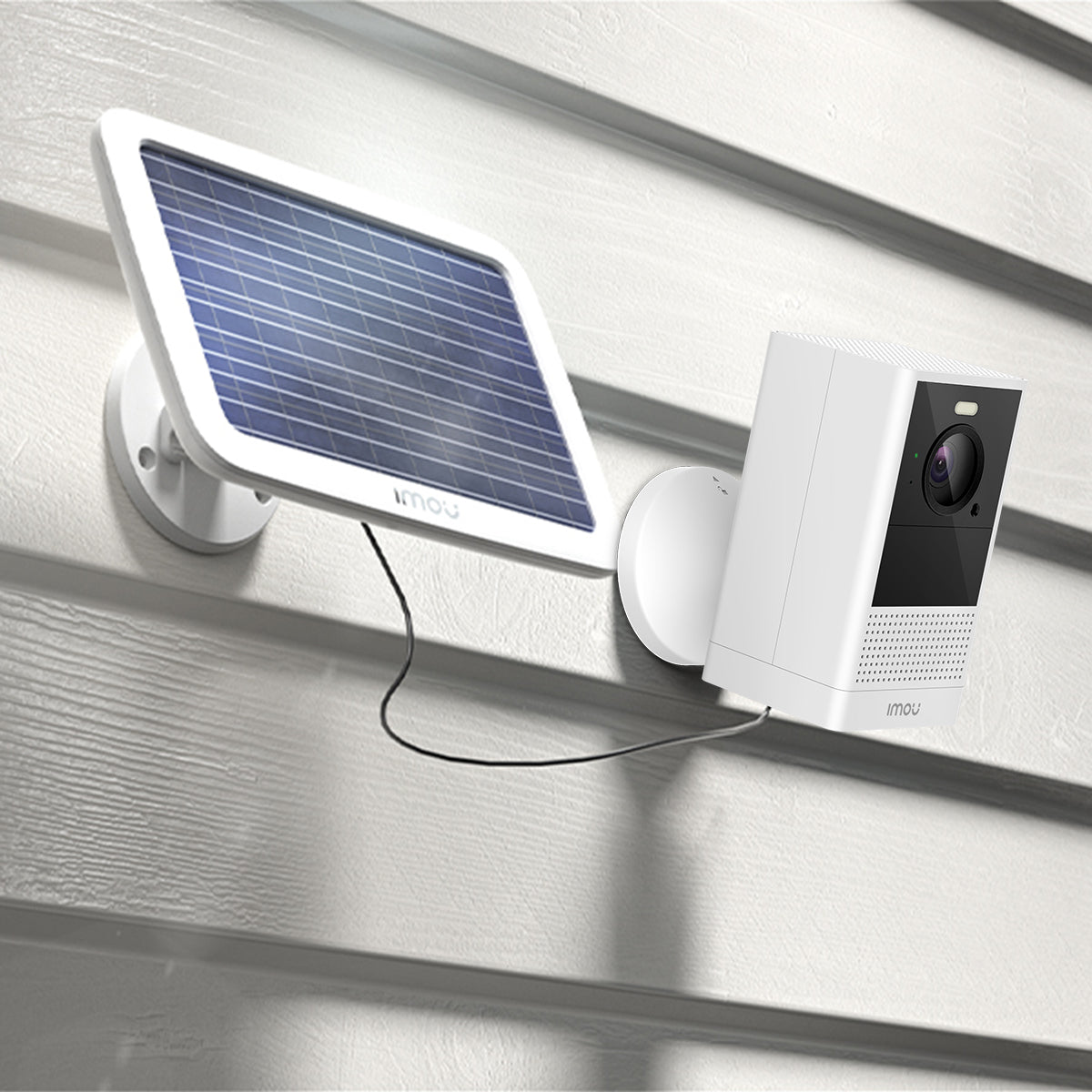 Imou Cell 2 4MP Battery Operated Wi-Fi Camera + Solar Panel Kit IPC-B46LP-White and FSP11 Cell 2 and Solar Panel Mounted on an outside wall CC473-6 and PS470 